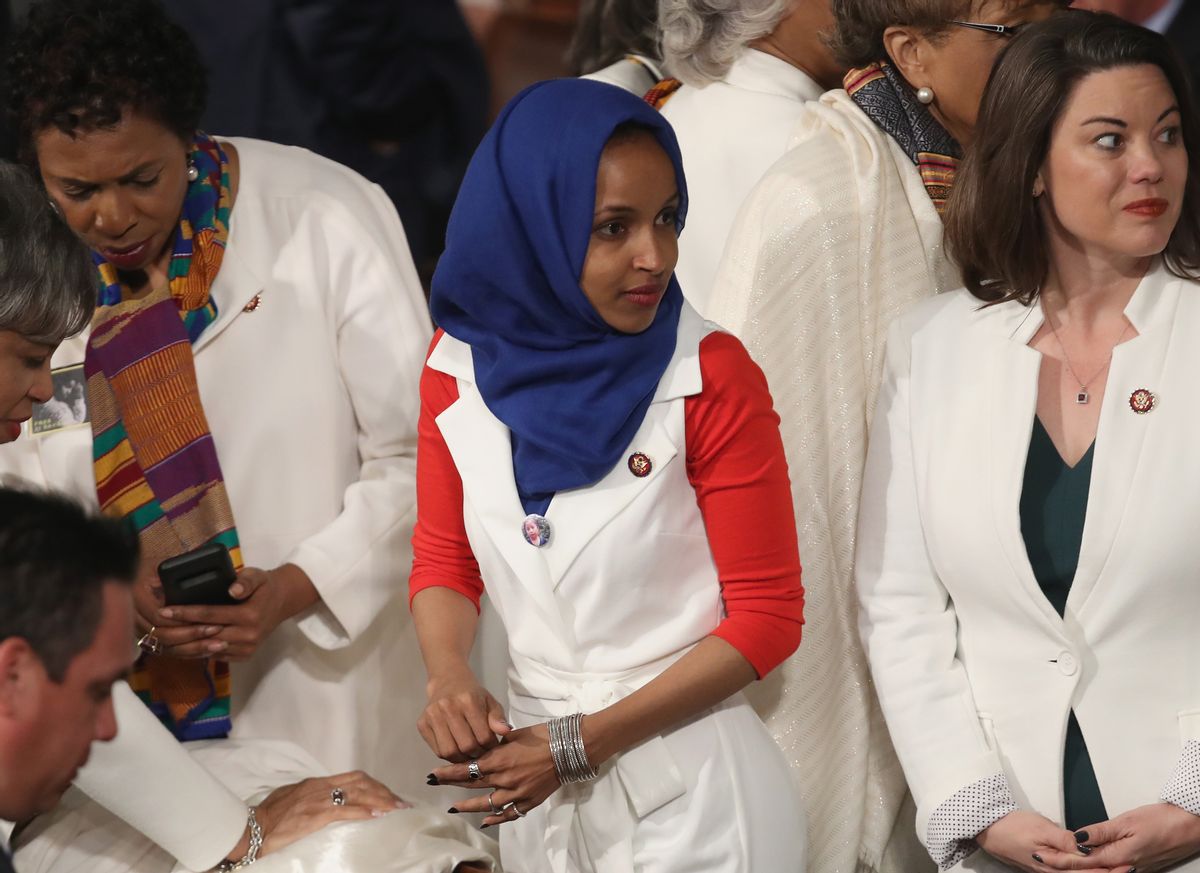 WASHINGTON, DC - FEBRUARY 05:  Rep. Ilhan Omar (D-MN) looks on ahead of the State of the Union address in the chamber of the U.S. House of Representatives at the U.S. Capitol Building on February 5, 2019 in Washington, DC. A group of female Democratic lawmakers chose to wear white to the speech in solidarity with women and a nod to the suffragette movement.  (Photo by Win McNamee/Getty Images) (Win McNamee/Getty Images)