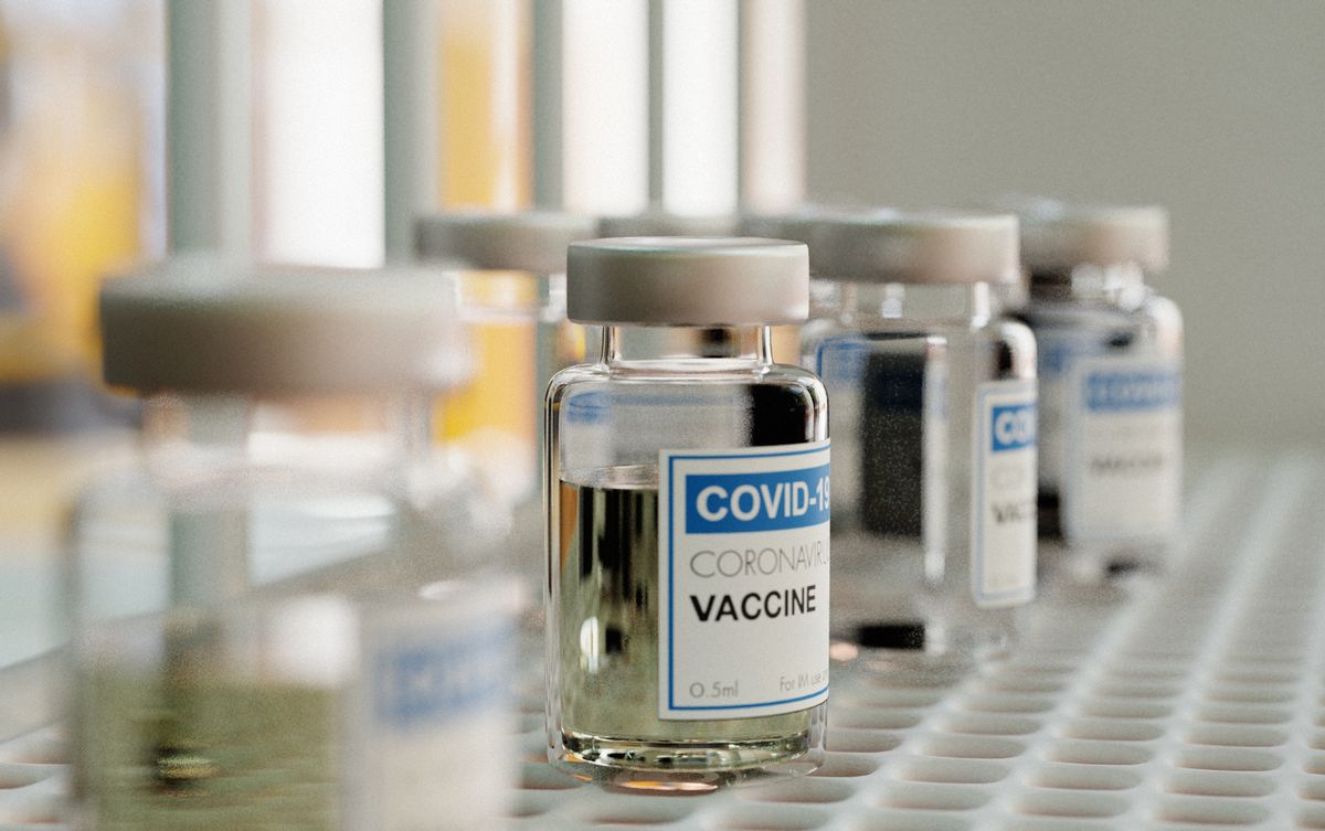 Close-up of a covid-19 vaccine flasks for tests on a medical shelf (Getty Images)
