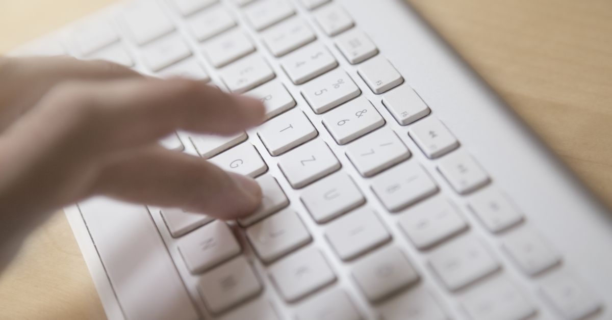 Closeup of a hands typing on a keyboard. Very shallow depth of field. (Getty Images/Stock photo)