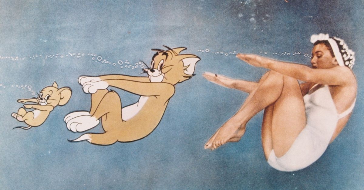 Esther Williams, US actress and former Olympic swimmer, swimming alongside cat-and-mouse duo, Tom and Jerry, in the animated sequence which featured in the film, 'Dangerous When Wet', USA, circa 1953. The musical, directed by Charles Walters (1911-1982), starred Williams as 'Katie Higgins'. (Photo by Silver Screen Collection/Getty Images) (Silver Screen Collection/Getty Images))