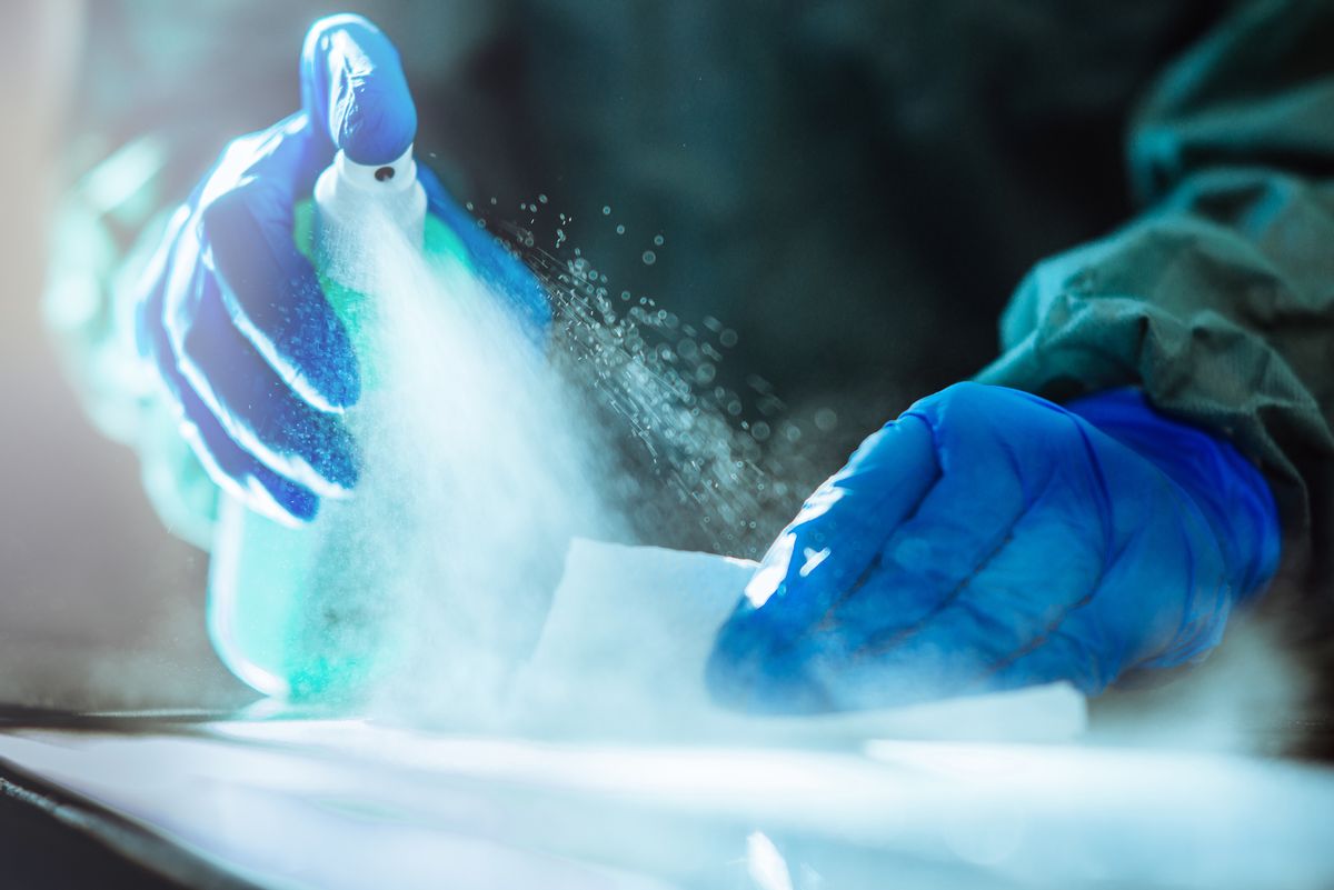 Spraying disinfection on surface. (Getty Images)
