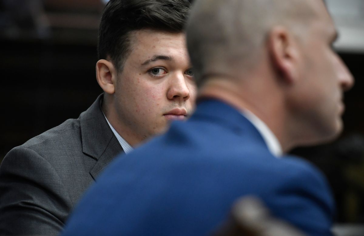 KENOSHA, WISCONSIN - NOVEMBER 17: Kyle Rittenhouse listens as the Judge Bruce Schroeder talks about how the jury will view video during deliberations in Kyle Rittenhouse's trial at the Kenosha County Courthouse on November 17, 2021 in Kenosha, Wisconsin. Rittenhouse is accused of shooting three demonstrators, killing two of them, during a night of unrest that erupted in Kenosha after a police officer shot Jacob Blake seven times in the back while being arrested in August 2020. Rittenhouse, from Antioch, Illinois, was 17 at the time of the shooting and armed with an assault rifle. He faces counts of felony homicide and felony attempted homicide. (Photo by Sean Krajacic - Pool/Getty Images) (Getty Images)