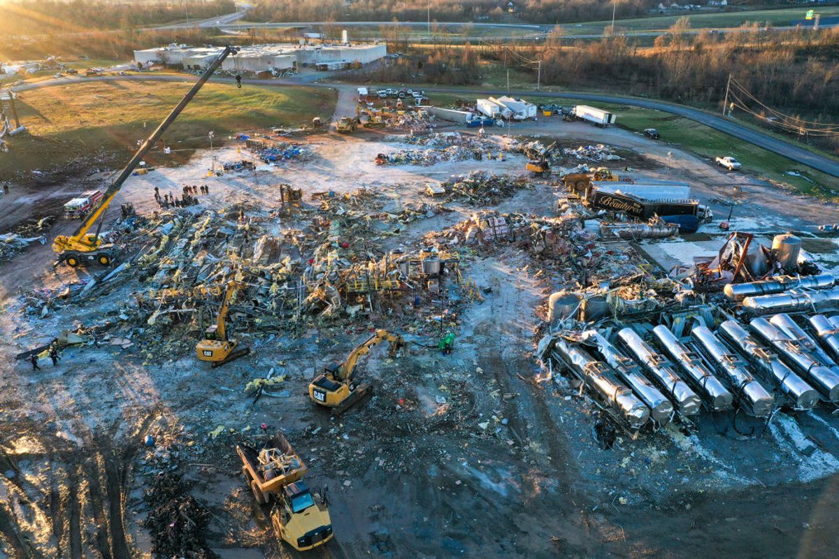 MAYFIELD, KENTUCKY - DECEMBER 13: An aerial view of debris and structural damage is seen at the Mayfield Consumer Products candle factory as search and rescue operations underway after tornadoes hit Mayfield, Kentucky on December 13, 2021. (Photo by Tayfun Coskun/Anadolu Agency via Getty Images) (Anadolu Agency / Getty Images)