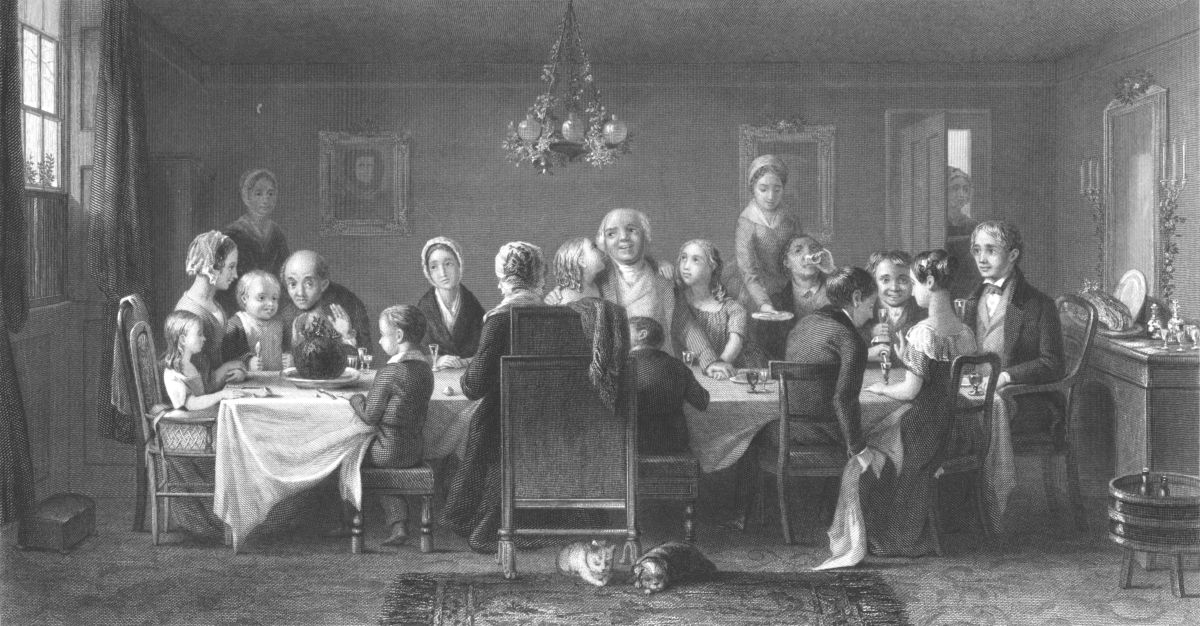 The Christmas Pudding', circa 1860s. A Victorian family gathered round the traditional plum pudding. Artist William Ridgway. (Photo by Print Collector/Getty Images) (Getty Images)