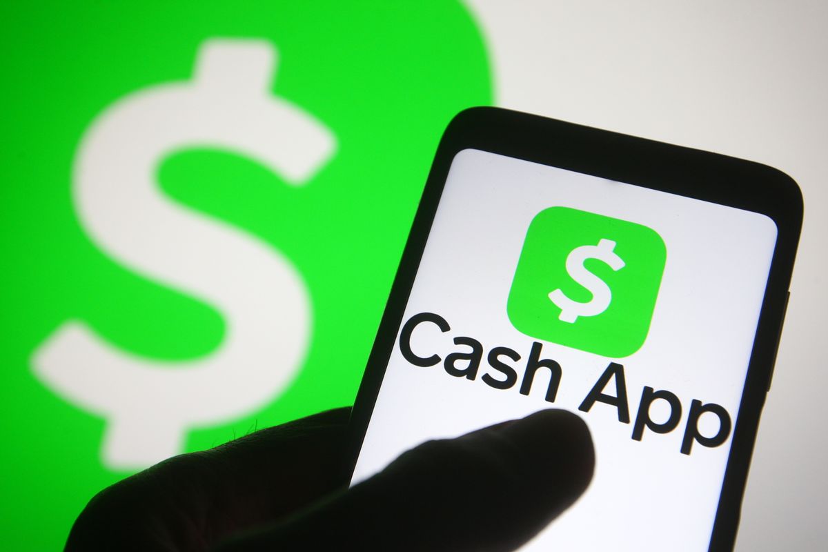 UKRAINE - 2021/03/21: In this photo illustration a Cash App and logo of a mobile payment service is seen on a smartphone in a screen. (Photo Illustration by Pavlo Gonchar/SOPA Images/LightRocket via Getty Images) (Pavlo Gonchar/SOPA Images/LightRocket via Getty Images)