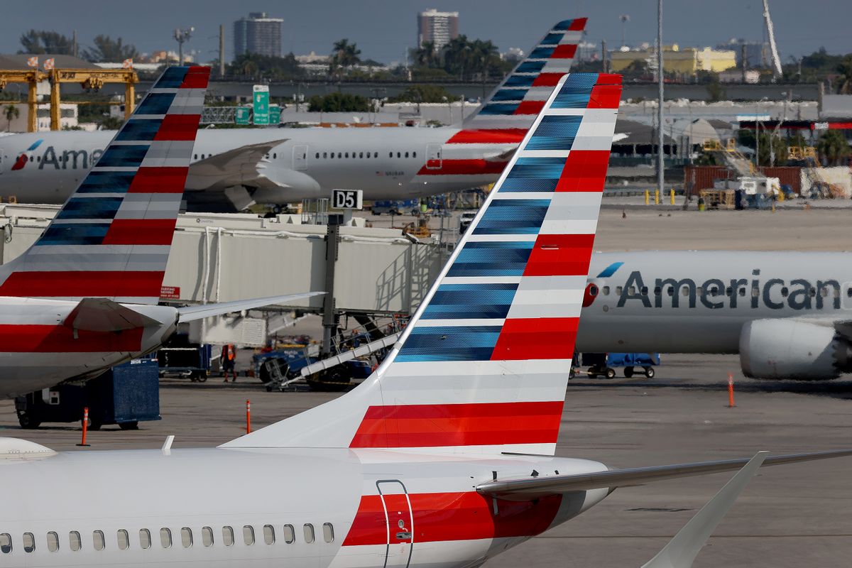 MIAMI, FLORIDA - DECEMBER 10: American Airlines planes parked at their gates in the Miami International Airport on December 10, 2021 in Miami, Florida. The American Airlines company announced it will discontinue service to several international destinations in 2022 amid the ongoing shortage of Boeing 787 aircraft. (Photo by Joe Raedle/Getty Images) (Joe Raedle/Getty Images)
