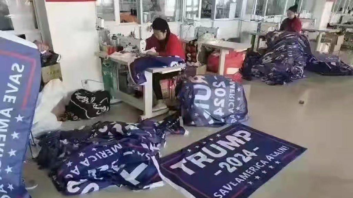 A picture purportedly showed Trump 2024 flags with a Save America Again slogan being made and sewn in China that were said to be official merchandise for former US president Donald Trump. (Twitter)