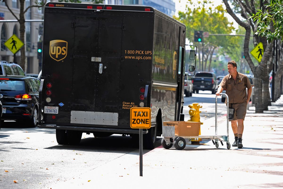 GLENDALE, CA - JULY 22:  A United Parcel Service (UPS) driver walks back to his truck after making a delivery on July 22, 2010 in Glendale, California. UPS said its second quarter profit nearly doubled posting a net profit of $845 million, or 84 cents a share, compared to $445 million or 44 cents a year ago.  (Photo by Kevork Djansezian/Getty Images) (Kevork Djansezian/Getty Images)