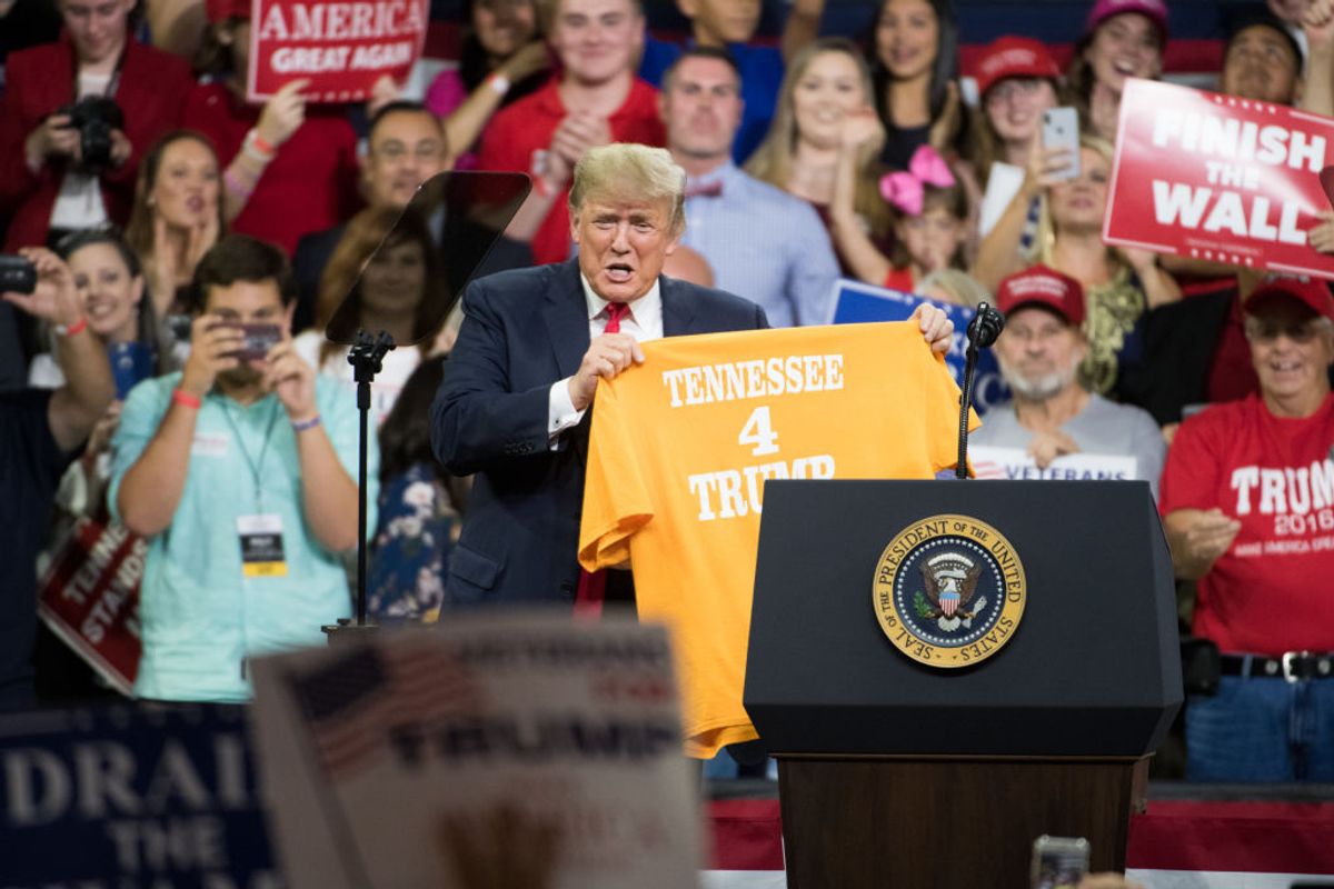 JOHNSON CITY, TN - OCTOBER 01: President Donald Trump shows off a t-shirt during a campaign rally at Freedom Hall on October 1, 2018 in Johnson City, Tennessee. President Trump held the rally to support Republican senate candidate Marsha Blackburn. (Photo by Sean Rayford/Getty Images) (Sean Rayford/Getty Images)