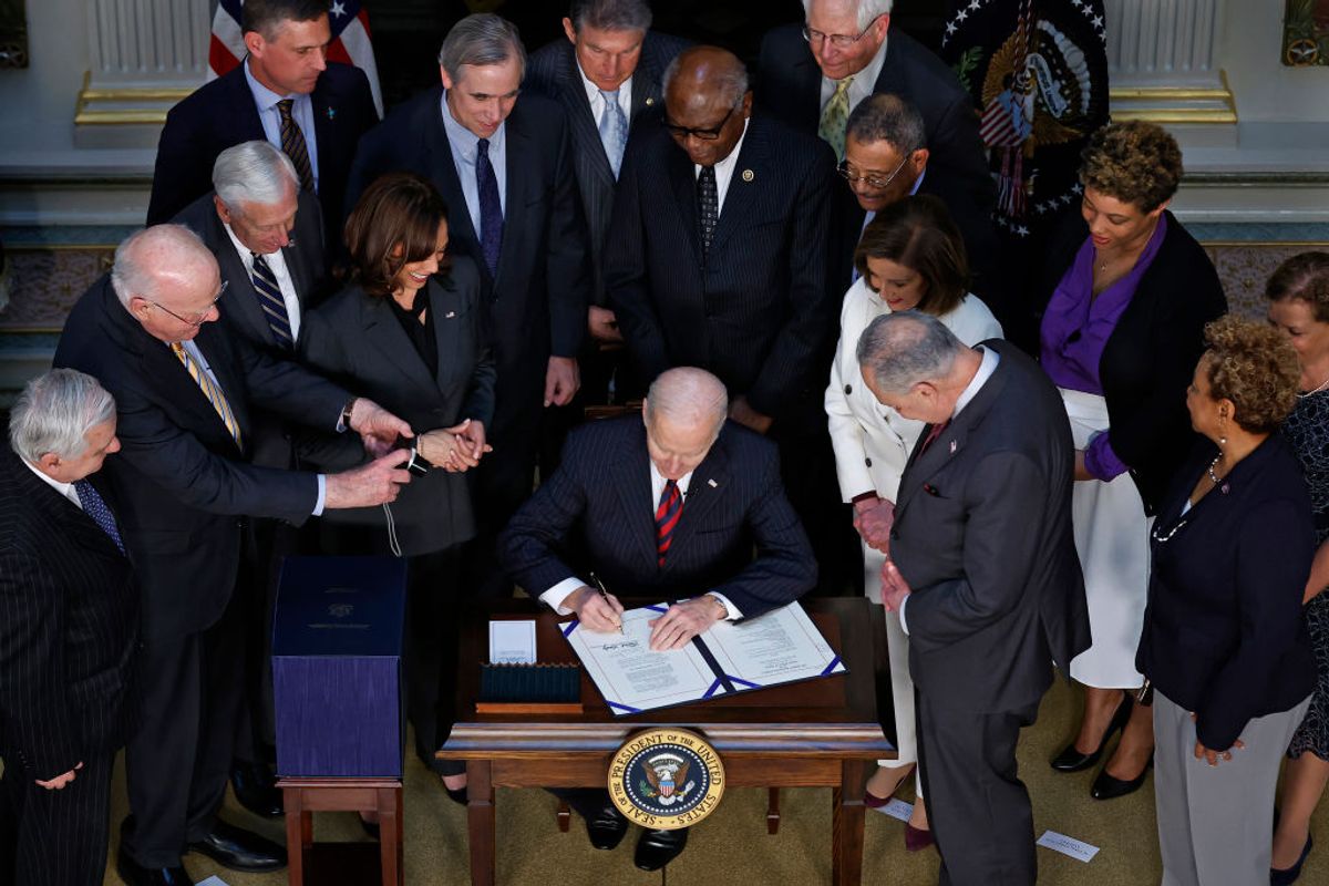 WASHINGTON, DC - MARCH 15: U.S. President Joe Biden is joined by Vice President Kamala Harris, Office of Management and Budget acting Director Shalanda Young and Congressional leaders as he signs the “Consolidated Appropriations Act" in the Indian Treaty Room in the Eisenhower Executive Office Building on March 15, 2022 in Washington, DC. Averting a looming government shutdown, the $1.5 trillion budget -- which includes $14 billion in humanitarian, military and economic assistance to Ukraine -- will fund the federal government through September 2022. (Photo by Chip Somodevilla/Getty Images) (Chip Somodevilla/Getty Images)
