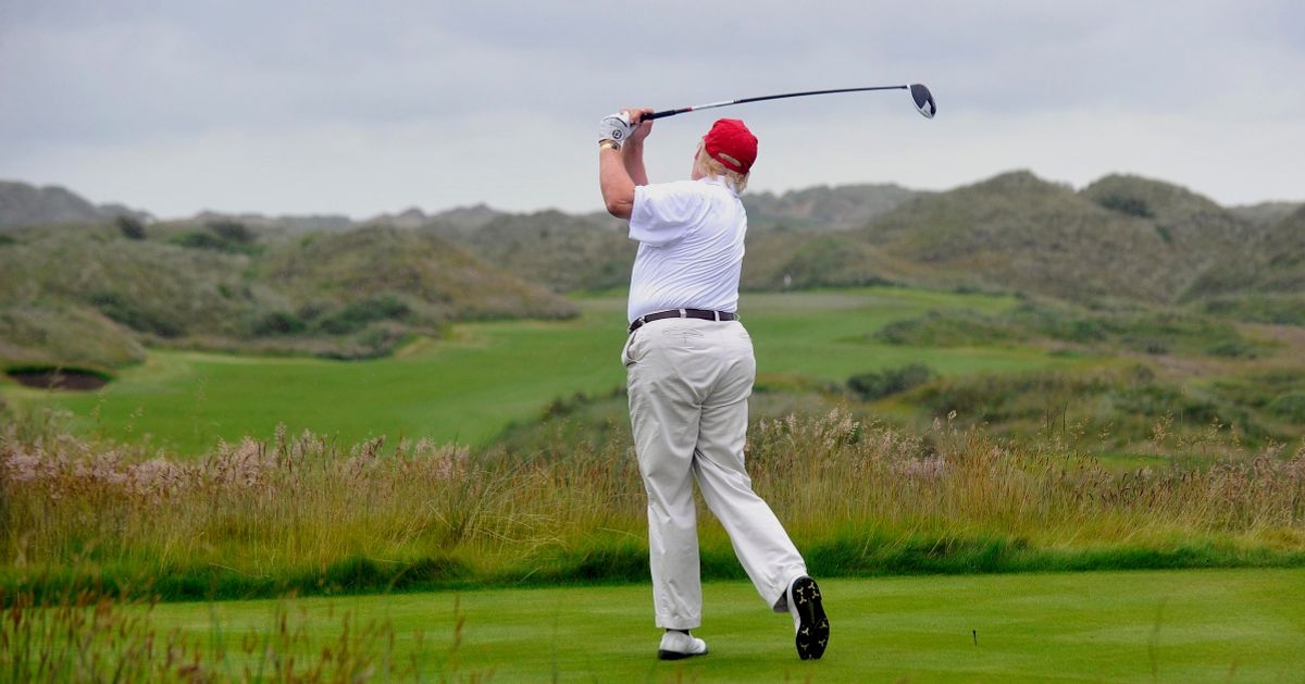 US tycoon Donald Trump plays a stroke as he officially opens his new multi-million pound Trump International Golf Links course in Aberdeenshire, Scotland, on July 10, 2012. US tycoon Donald Trump struck the first ball on his new luxury golf course in Scotland on Tuesday, teeing off in a ceremony alongside golfing great Colin Montgomerie.  AFP PHOTO / Andy Buchanan (Photo by Andy Buchanan / AFP) (Photo by ANDY BUCHANAN/AFP via Getty Images) (Andy Buchanan/AFP via Getty Images)