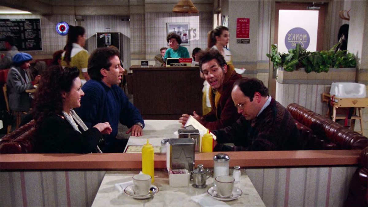 According to Seinfeld writer and executive story editor Carol Leifer she had to try to not break character while Jason Alexander tried to make her laugh during The Kiss Hello episode. (Courtesy: Netflix) (Netflix)