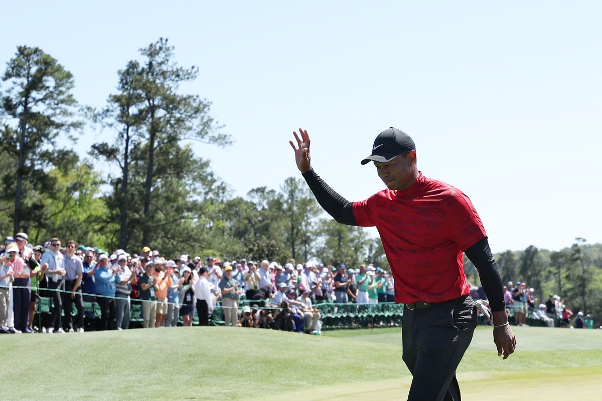 AUGUSTA, GEORGIA - APRIL 10: Tiger Woods waves to the crowd on the 18th green after finishing his round during the final round of the Masters at Augusta National Golf Club on April 10, 2022 in Augusta, Georgia. (Photo by Gregory Shamus/Getty Images) (Gregory Shamus/Getty Images)