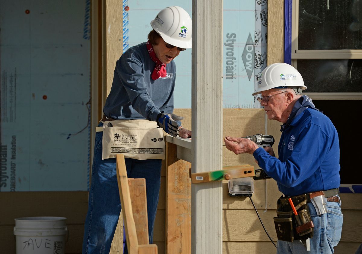 DENVER, CO - OCTOBER 09: Former president Jimmy Carter and his wife, Rosalynn, work on building a home during Habitat for Humanity's Carter Work Project event in the Globeville Neighborhood in Denver, October 09, 2013. Since 1984 the former president and his wife have dedicated a week of their time to help build Habitat homes. (Photo By RJ Sangosti/The Denver Post via Getty Images) (Getty Images)