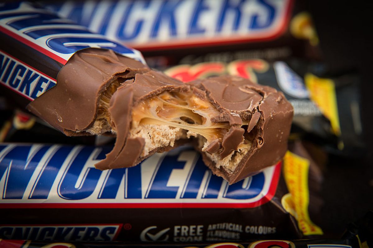 BRISTOL, UNITED KINGDOM - FEBRUARY 23:  In this photo illustration Mars and Snickers chocolate bars are seen on February 23, 2016 in Bristol, England. The Mars company, which owns both brands, has announced a recall of chocolate products in 55 countries following the discovery of bits of plastic in a chocolate bar produced in one of the company's plants in Holland.  (Photo by Matt Cardy/Getty Images)