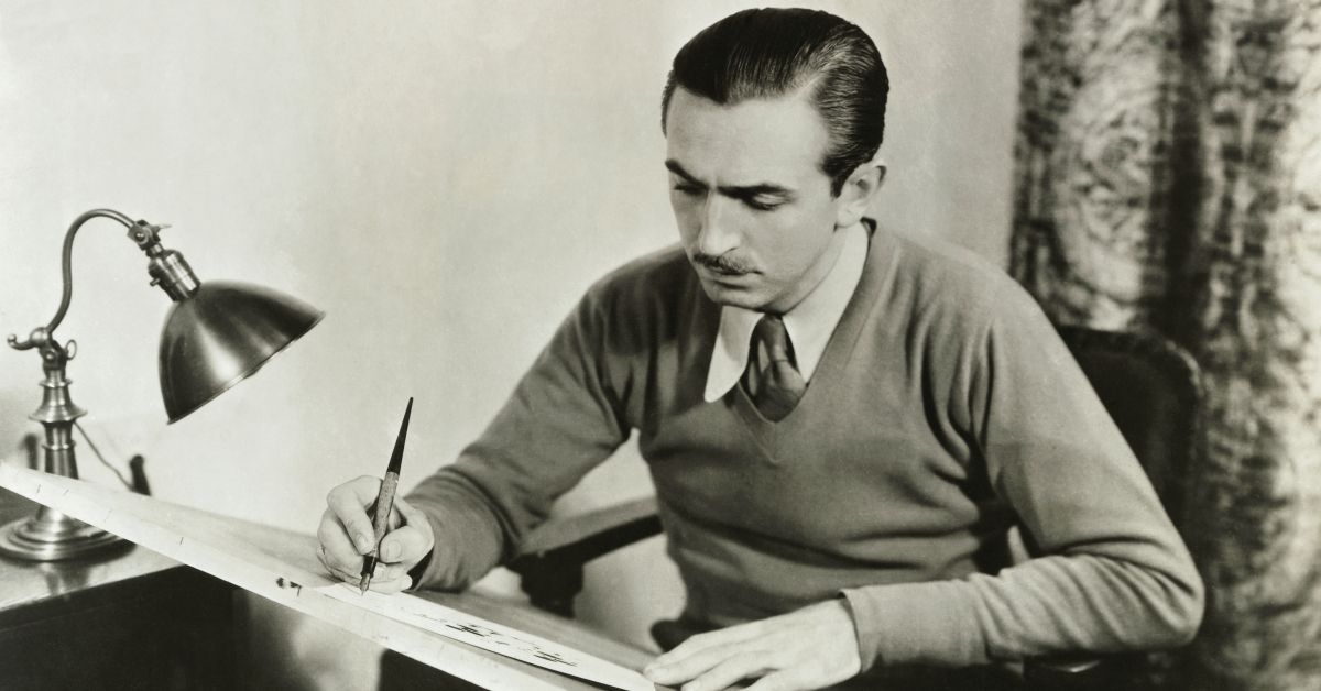 (Original Caption) Walt Disney (1901-1966), famed originator of full-length animated motion pictures, at work at his drawing board. (Bettmann/Getty Images)