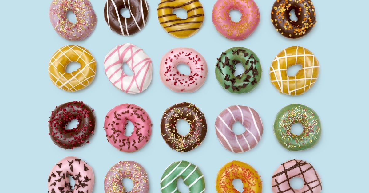 Colourful doughnuts, studio shot. (Getty Images/Stock photo)