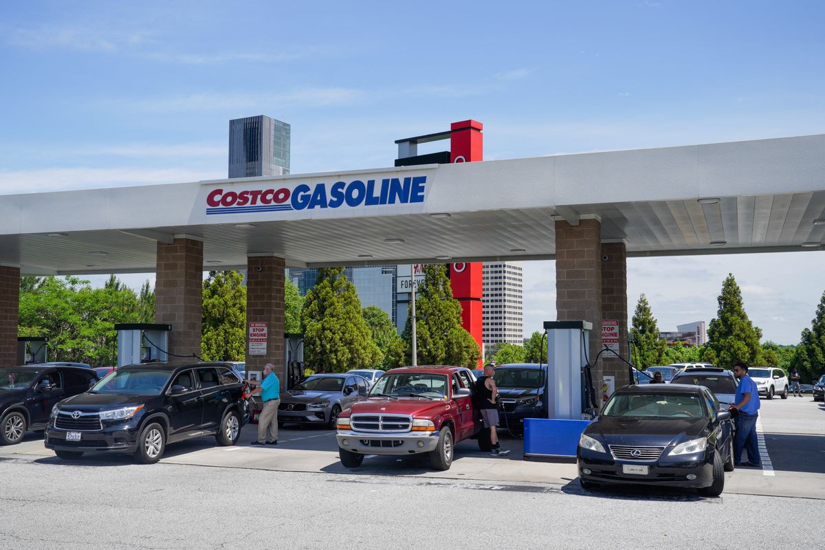 Consumers pump gas at a Costco gasoline station on May 11, 2021, in Atlanta, Georgia. - Fears the shutdown of a major fuel pipeline would cause a gasoline shortage led to some panic buying and prompted US regulators on May 11, 2021 to temporarily suspend clean fuel requirements in three eastern states and the nation's capital. A ransomware attack Friday on Colonial Pipeline forced the company to shut down its entire network, though industry experts say any shortages will be temporary. (Photo by Elijah Nouvelage / AFP) (Photo by ELIJAH NOUVELAGE/AFP via Getty Images) (ELIJAH NOUVELAGE/AFP via Getty Images)