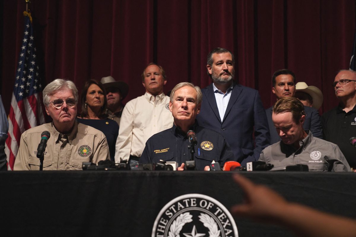 Texas Governor Greg Abbott with other officials, holds a press conference to provide updates on the Uvalde elementary school shooting, at Uvalde High School in Uvalde, Texas on May 25, 2022. - The tight-knit Latino community of Uvalde was wracked with grief Wednesday after a teen in body armor marched into the school and killed 19 children and two teachers, in the latest spasm of deadly gun violence in the US. (Photo by allison dinner / AFP) (Photo by ALLISON DINNER/AFP via Getty Images) (ALLISON DINNER/AFP via Getty Images)