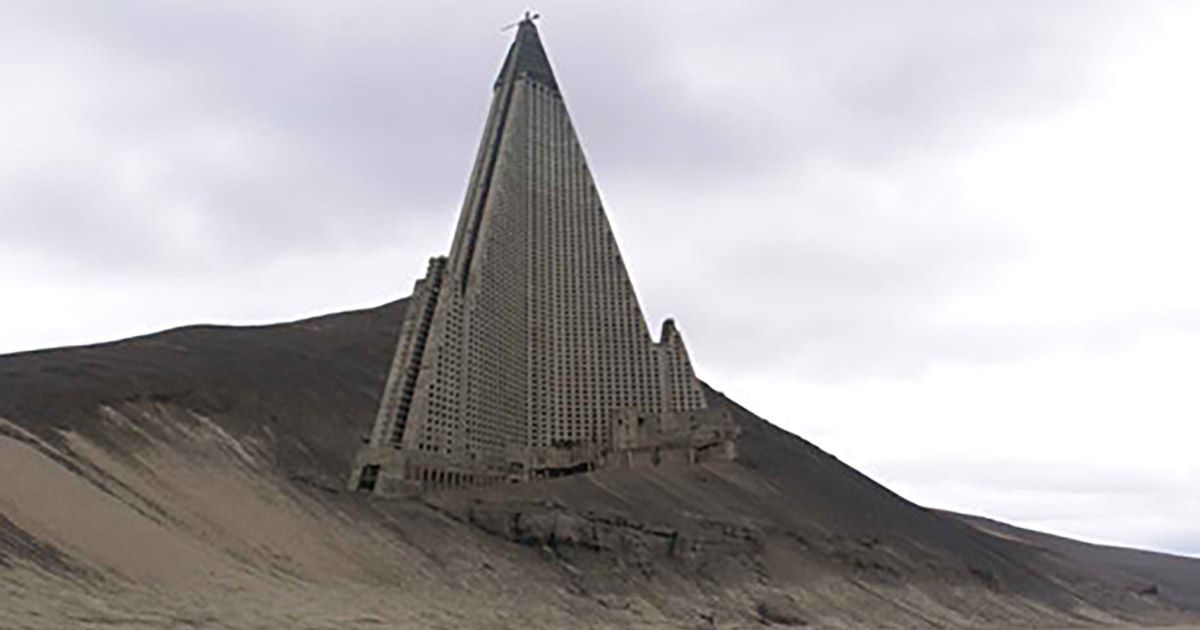 The Ryugyong Hotel picture of the pyramid building in a sand dune or dirt hill originally came from an illustration from Nicolas Moulin. (Nicolas Moulin)