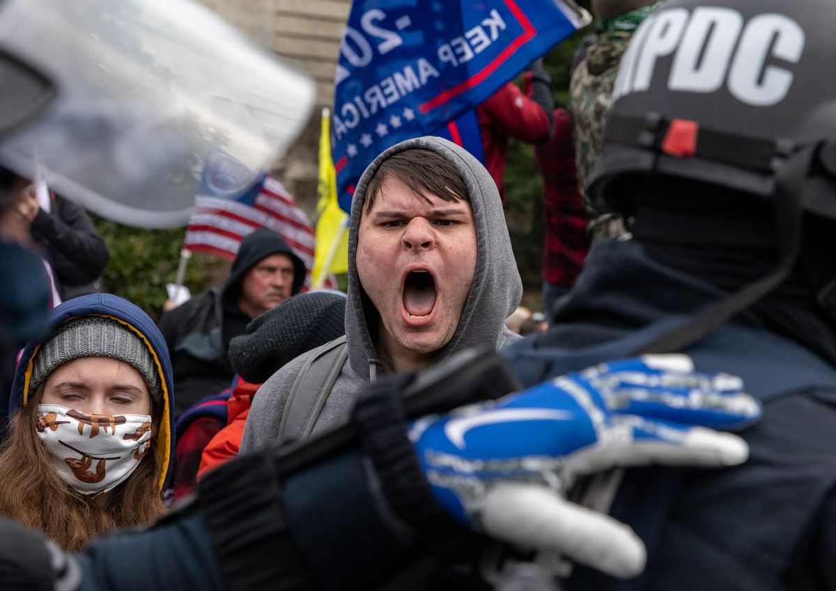 WASHINGTON DC - JANUARY 6: Pro-Trump protestors clash with police during the tally of electoral votes that that would certify Joe Biden as the winner of the U.S. presidential election outside the US Capitol in Washington, DC on Wednesday, January 6, 2021. (Amanda Andrade-Rhoades/For The Washington Post via Getty Images) (Amanda Andrade-Rhoades/For The Washington Post via Getty Images)