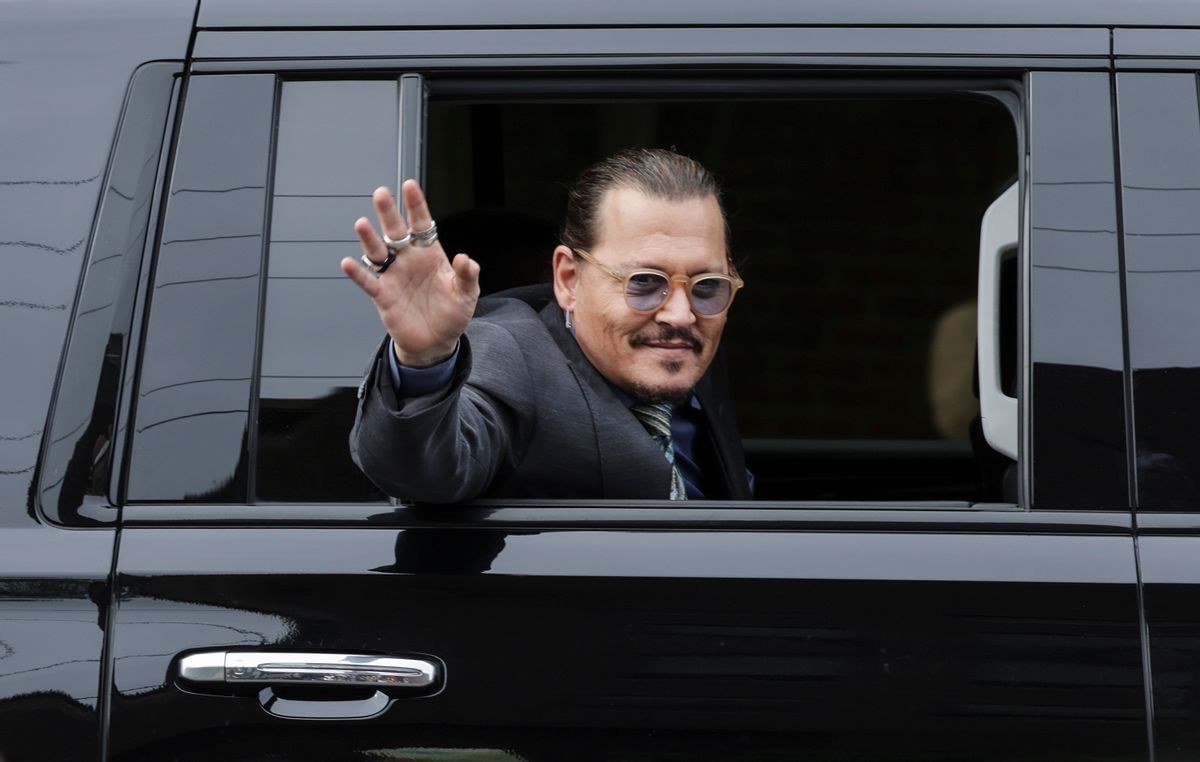 FAIRFAX, VIRGINIA - MAY 25: Actor Johnny Depp waves to supporters as he leaves the Fairfax County Courthouse on May 25, 2022 in Fairfax, Virginia. The Depp v. Heard, a defamation trial brought by Johnny Depp against his ex-wife Amber Heard is in its last week of trial with closing argument scheduled on this Friday. (Photo by Kevin Dietsch/Getty Images) (Kevin Dietsch/Getty Images)