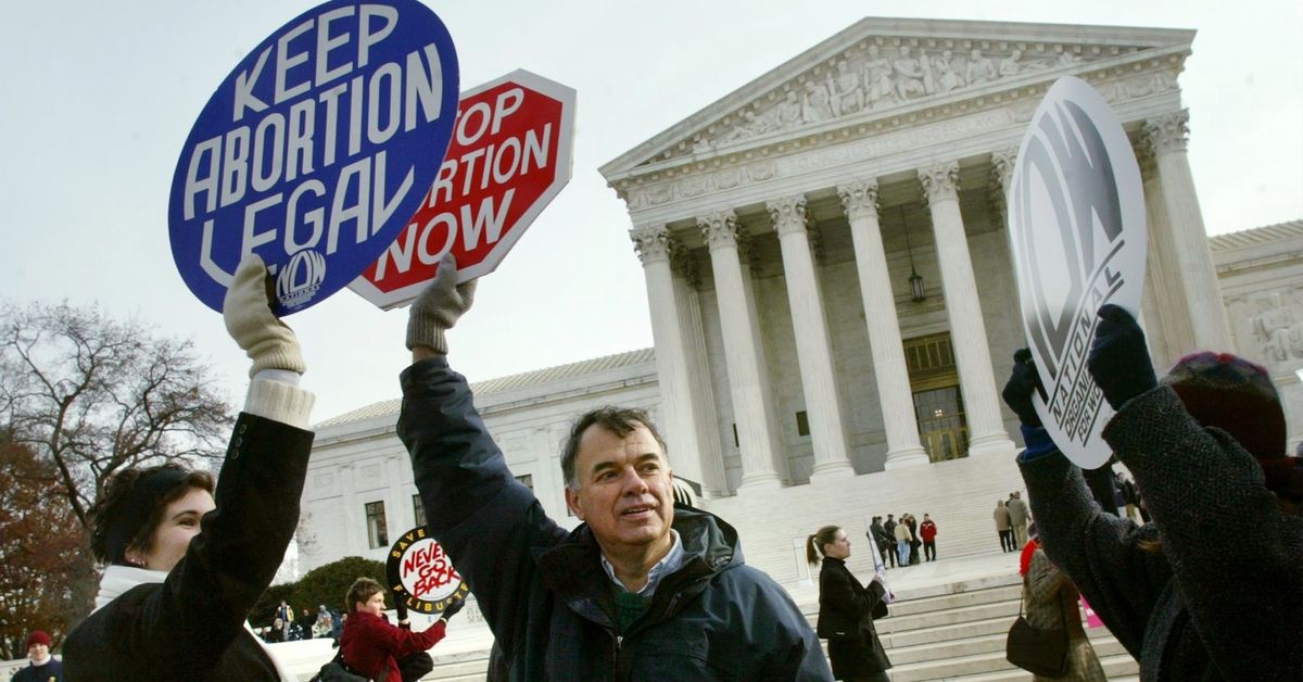WASHINGTON - DECEMBER 4:  Jack Ames gets his "Stop Abortion Now" sign blocked by a women holding a "Keep Abortion Legal" sign during a protest in front of the U.S. Supreme Court December 4, 2002 in Washington, DC. The high court is hearing oral arguments in the Scheidler v. NOW case and is considering whether the RICO act can be used to punish anti-abortion protesters. Operation Rescue, anti-abortion leader Joseph Scheidler and others are appealing a case first dealt with nine years ago to the Supreme Court. The National Organization for Women (NOW) and abortion clinics in Wisconsin and Delaware sued the anti-abortion groups for "violent tactics."  (Photo by Mark Wilson/Getty Images) (Mark Wilson/Getty Images)