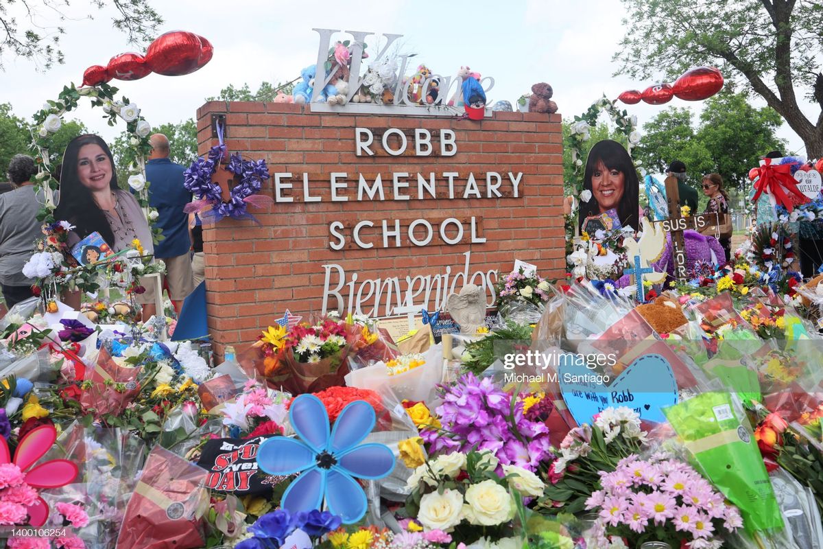 UVALDE, TEXAS - MAY 30: People visit a memorial for the 19 children and two adults killed on May 24th during a mass shooting at Robb Elementary School on May 30, 2022 in Uvalde, Texas. Visitations for Amerie Jo Garza and Maite Rodriguez, two of the 19 children killed in the May 24th Robb Elementary School mass shooting are being held today. Wakes and funerals for the 21 victims will be scheduled throughout the week. (Photo by Michael M. Santiago/Getty Images) (Michael M. Santiago/Getty Images)