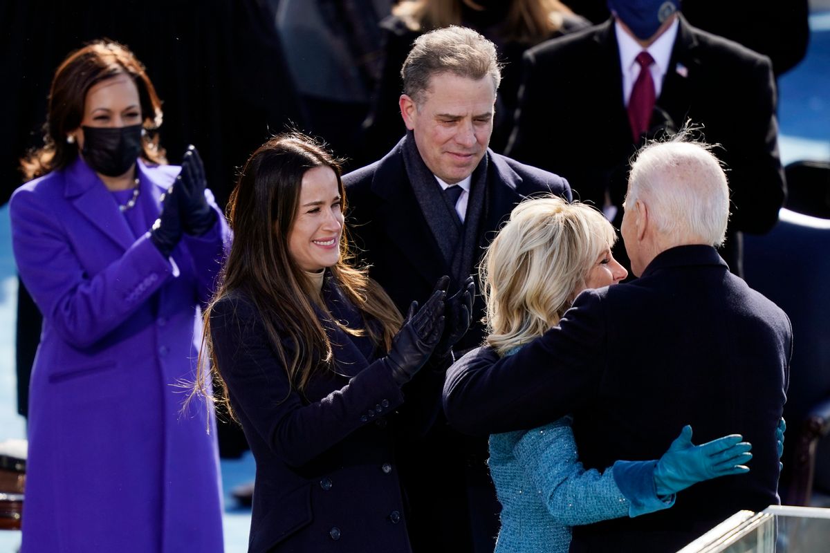WASHINGTON, DC - JANUARY 20:  U.S. President Joe Biden embraces First Lady Dr. Jill Biden as son Hunter Biden, daughter Ashley Biden, and Vice President Kamala Harris look on after Biden was sworn in during his inauguration on the West Front of the U.S. Capitol on January 20, 2021 in Washington, DC.  During today's inauguration ceremony Joe Biden becomes the 46th president of the United States. (Photo by Drew Angerer/Getty Images) (Drew Angerer/Getty Images)
