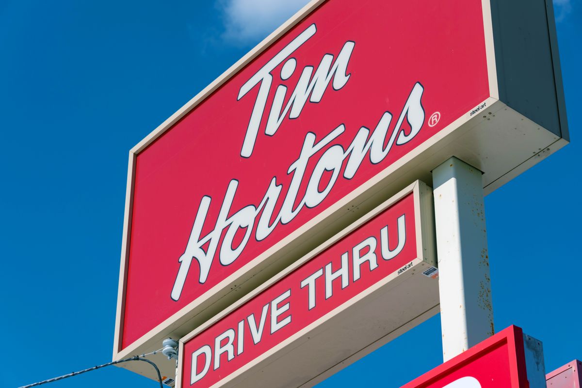 TORONTO, ONTARIO, CANADA - 2016/03/04: Tim Horton's drive through sign: Tim Horton is known all over Canada for serving hot and delicious coffee specially in winter time. (Photo by Roberto Machado Noa/LightRocket via Getty Images) (Roberto Machado Noa/LightRocket via Getty Images)