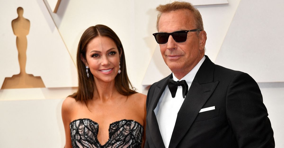 US actor Kevin Costner(R) and his wife Christine Baumgartner attend the 94th Oscars at the Dolby Theatre in Hollywood, California on March 27, 2022. (Photo by ANGELA  WEISS / AFP) (Photo by ANGELA  WEISS/AFP via Getty Images) (Getty Images)