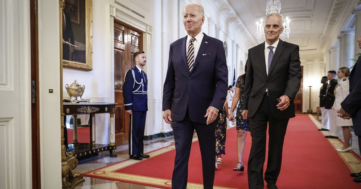 WASHINGTON, DC - AUGUST 10: (L-R) U.S. President Joe Biden and Secretary of Veterans Affairs Denis McDonough walk through the Cross Hall to the East Room for a signing ceremony for The PACT Act at the White House August 10, 2022 in Washington, DC. The bill is the biggest expansion of veteran's benefits since the Agent Orange Act of 1991 and will expand health care benefits to millions of veterans exposed to toxic substances during their military service. (Photo by Chip Somodevilla/Getty Images) (Getty Images)