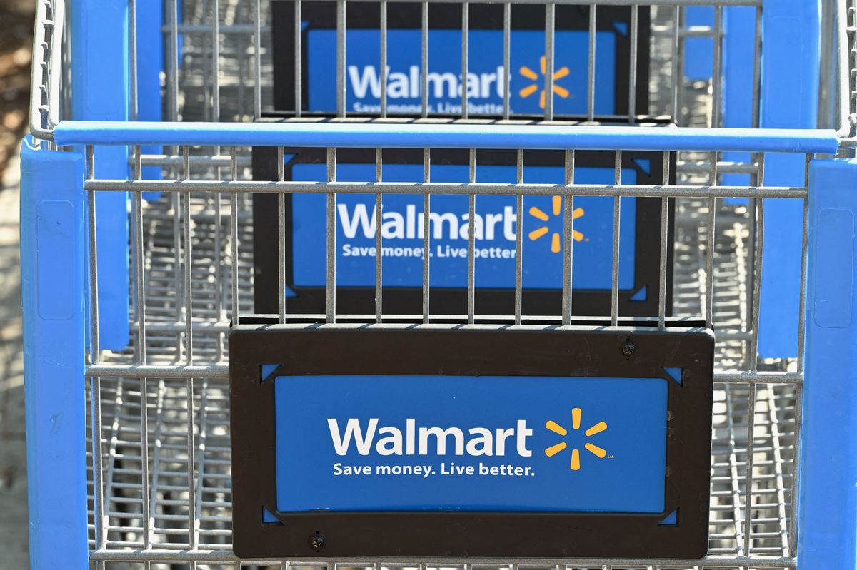 Shopping carts with the Walmart logo are seen outside a Walmart store in Burbank, California on August 15, 2022. - Walmart, the largest retailer the United States, will report second quarter earnings on August 16, 2022. (Photo by Robyn Beck / AFP) (Photo by ROBYN BECK/AFP via Getty Images) (ROBYN BECK/AFP via Getty Images)