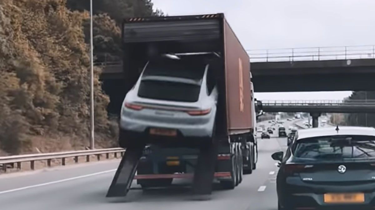 A video claims to show a real, high-speed police chase in which a Porsche Cayenne SUV drives up a ramp to hide in the back of a truck. (Courtesy: @2ncs/Instagram) (@2ncs/Instagram)