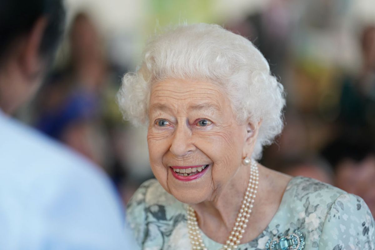 MAIDENHEAD, ENGLAND - JULY 15: Queen Elizabeth II smiles during a visit to officially open the new building at Thames Hospice on July 15, 2022 in Maidenhead, England. (Photo by Kirsty O'Connor-WPA Pool/Getty Images) (Getty Images)