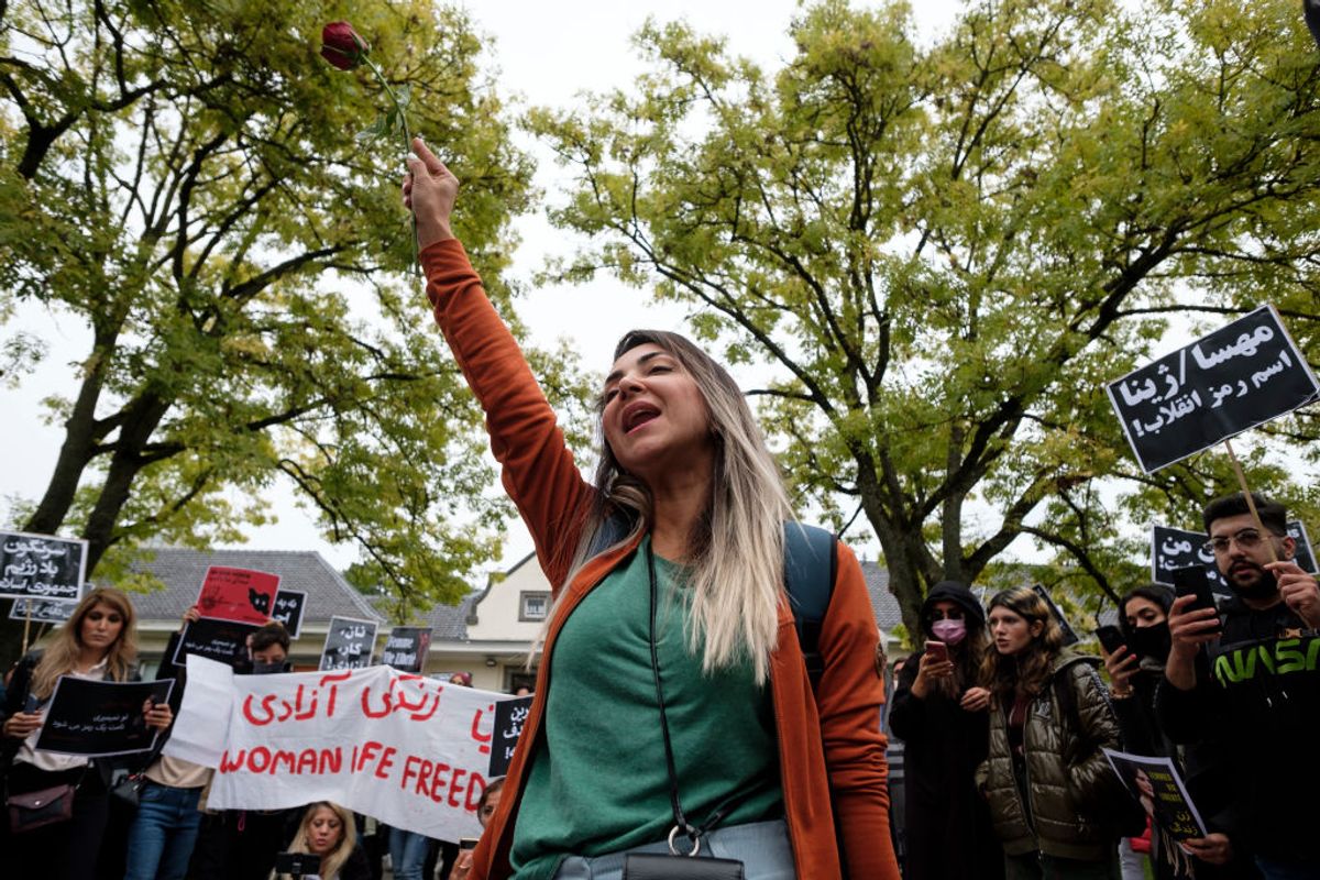BRUSSELS, BELGIUM - SEPTEMBER 23: About 100 persons, mainly women, demonstrate on the Avenue Franklin Roosvelt, in front of the Iranian embassy to protest against the murder of  Zhina Amini on September 23, 2022 in Brussels, Belgium. Mahsa (Zhina Amini) was brutally murdered by the morality police for wearing her hijab improperly. (Photo by Thierry Monasse/Getty Images) (Getty Images)