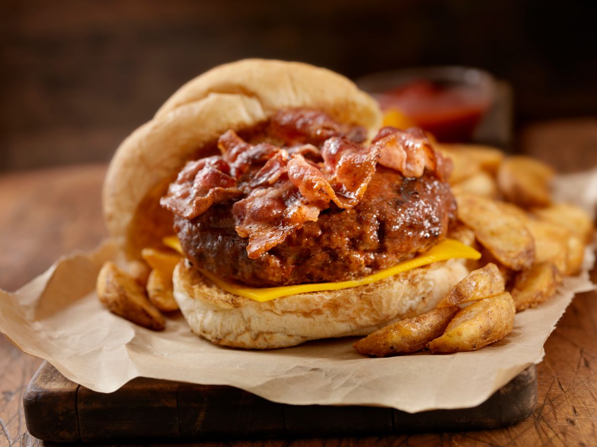 Bacon CheeseBurger on a toasted Kaiser Bun with Wedge cut French Fries-Photographed on Hasselblad H3D-39mb Camera (Getty Images)