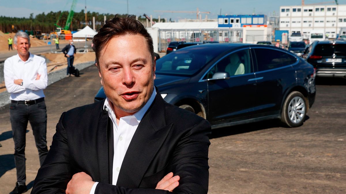 Tesla CEO Elon Musk talks to media as he arrives to visit the construction site of the future US electric car giant Tesla, on Sept. 3, 2020, in Gruenheide near Berlin. (Photo by ODD ANDERSEN/AFP via Getty Images) (ODD ANDERSEN/AFP via Getty Images)