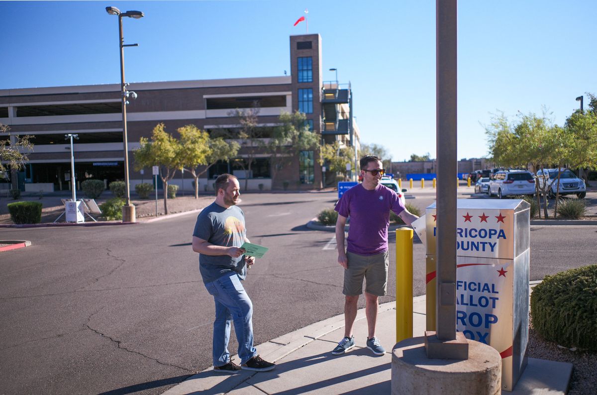 Voters have encountered armed poll ‘watchers’ in Mesa, Arizona. (Getty Images)