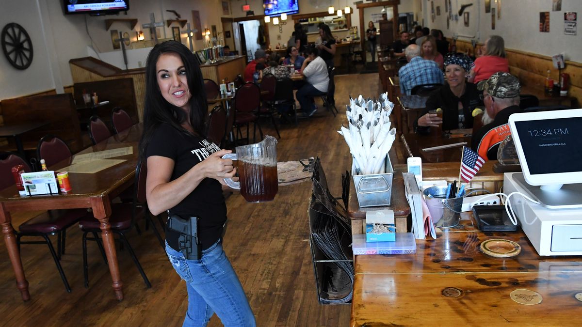 Lauren Boebert, owner of Shooters Grill, is photographed with a gun on her hip on May 29, 2018, in Rifle, Colorado. (Photo by RJ Sangosti/The Denver Post via Getty Images) (RJ Sangosti/The Denver Post via Getty Images)