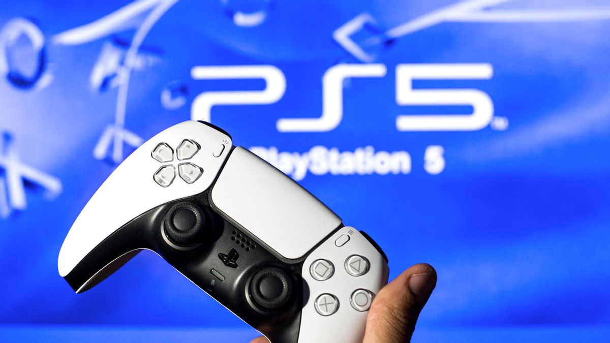 In this photo illustration, a PlayStation 5 controller seen with a PS5 logo in the background. (Photo Illustration by Thiago Prudencio/SOPA Images/LightRocket via Getty Images) (Photo Illustration by Thiago Prudencio/SOPA Images/LightRocket via Getty Images)