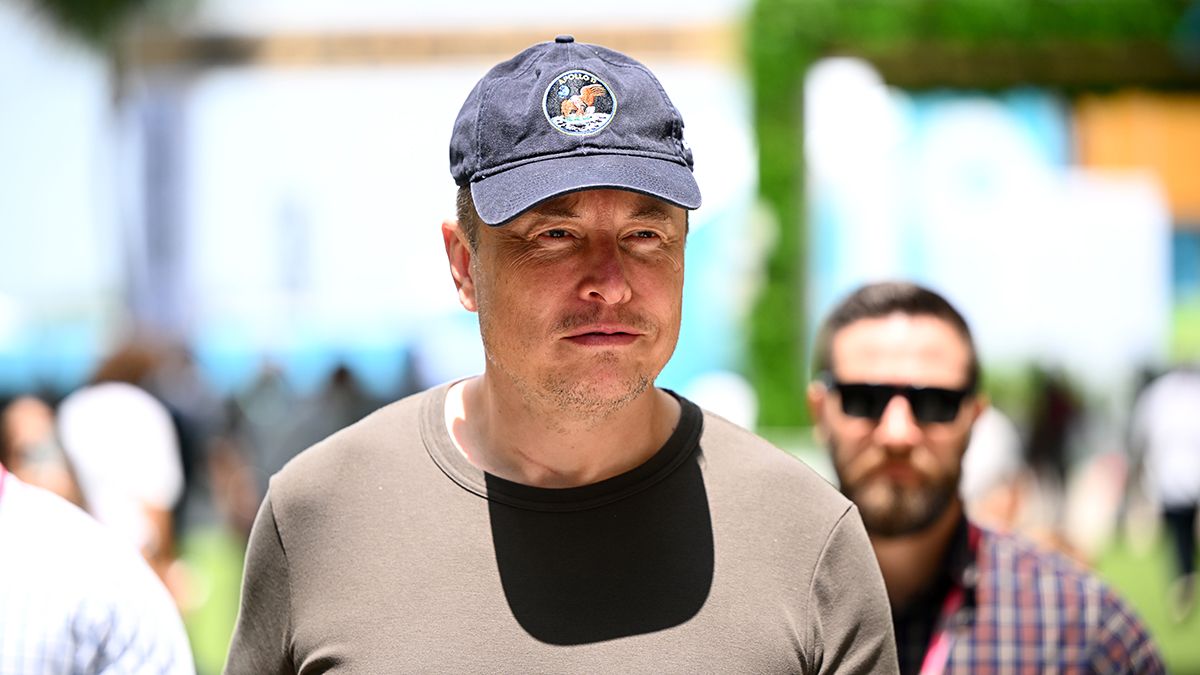 Elon Musk walks in the Paddock prior to final practice ahead of the F1 Grand Prix of Miami at Miami International Autodrome on May 06, 2023. (Photo by Clive Mason - Formula 1/Formula 1 via Getty Images) (Clive Mason - Formula 1/Formula 1 via Getty Images)