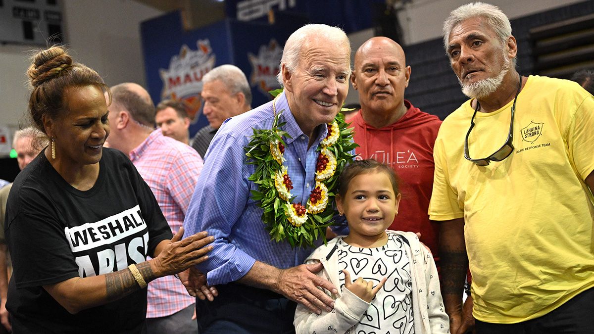 U.S. President Joe Biden poses for photos after speaking during a community engagement event at the Lahaina Civic Center in Lahaina, Hawaii on Aug. 21, 2023. (Photo by Mandel NGAN / AFP) (Photo by MANDEL NGAN/AFP via Getty Images) (MANDEL NGAN/AFP via Getty Images)