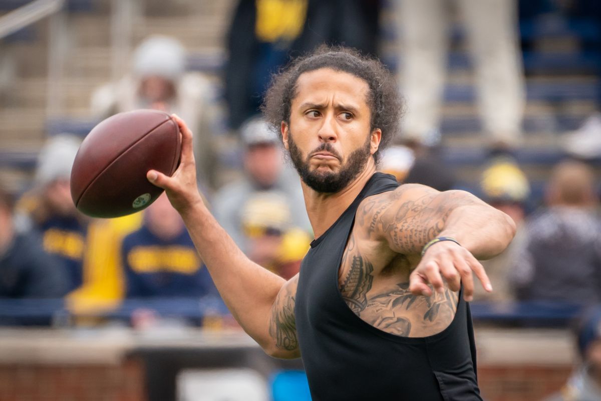 Colin Kaepernick participates in a throwing exhibition during half time of the Michigan spring football game at Michigan Stadium on April 2, 2022 in Ann Arbor, Michigan.  (Jaime Crawford/Getty Images)