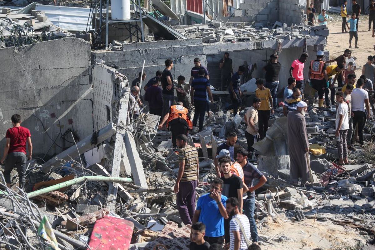 Palestinian emergency services and local citizens search for victims in buildings destroyed during Israeli air raids in the southern Gaza Strip on Oct. 19, 2023. ( Getty Images)