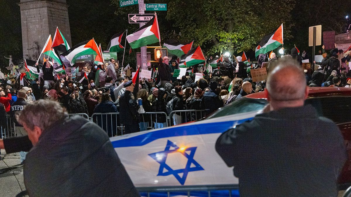 Counter-protesters hold an Israeli flag across the street from the main pro-Palestinian protest before a march through Midtown Manhattan during a protest calling for a ceasefire between Israel and Hamas. (Photo by Michael Nigro/Pacific Press/LightRocket via Getty Images) (Michael Nigro/Pacific Press/LightRocket via Getty Images)