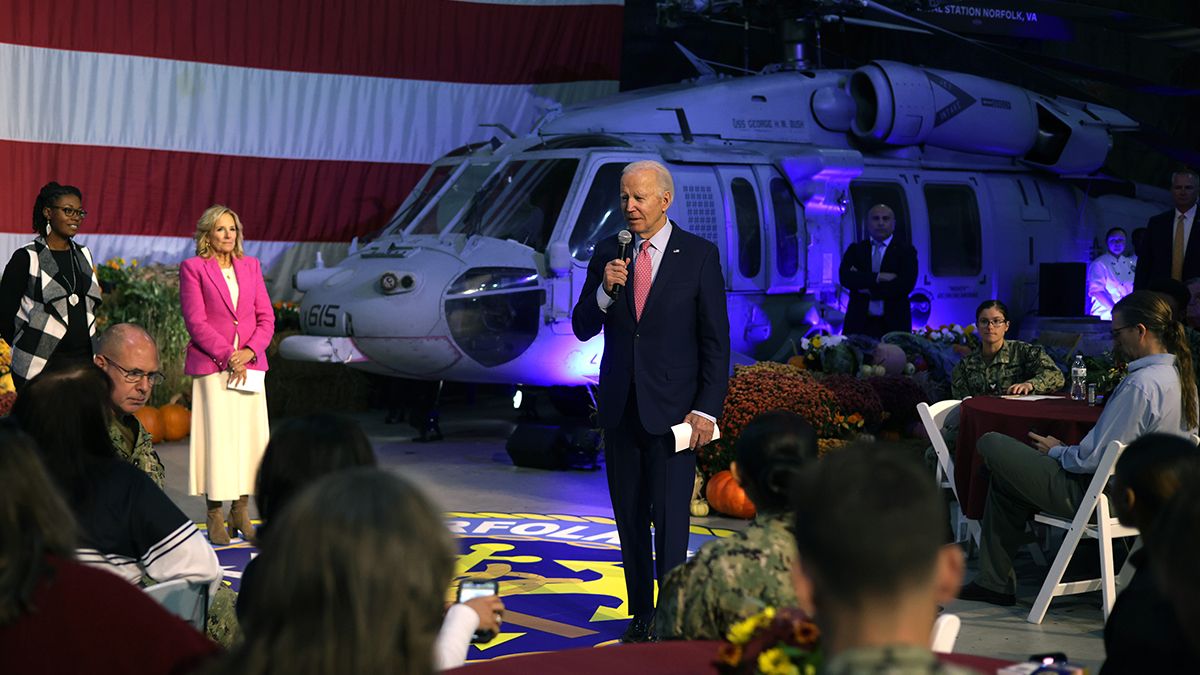 U.S. President Joe Biden speaks as first lady Jill Biden and Navy wife Sibrena Sears listen during a Friendsgiving event for service members and military families from the USS Dwight D. Eisenhower and the USS Gerald R. Ford at the Norfolk Naval Station on Nov. 19, 2023 in Norfolk, Virginia. (Photo by Alex Wong/Getty Images) (Alex Wong/Getty Images)