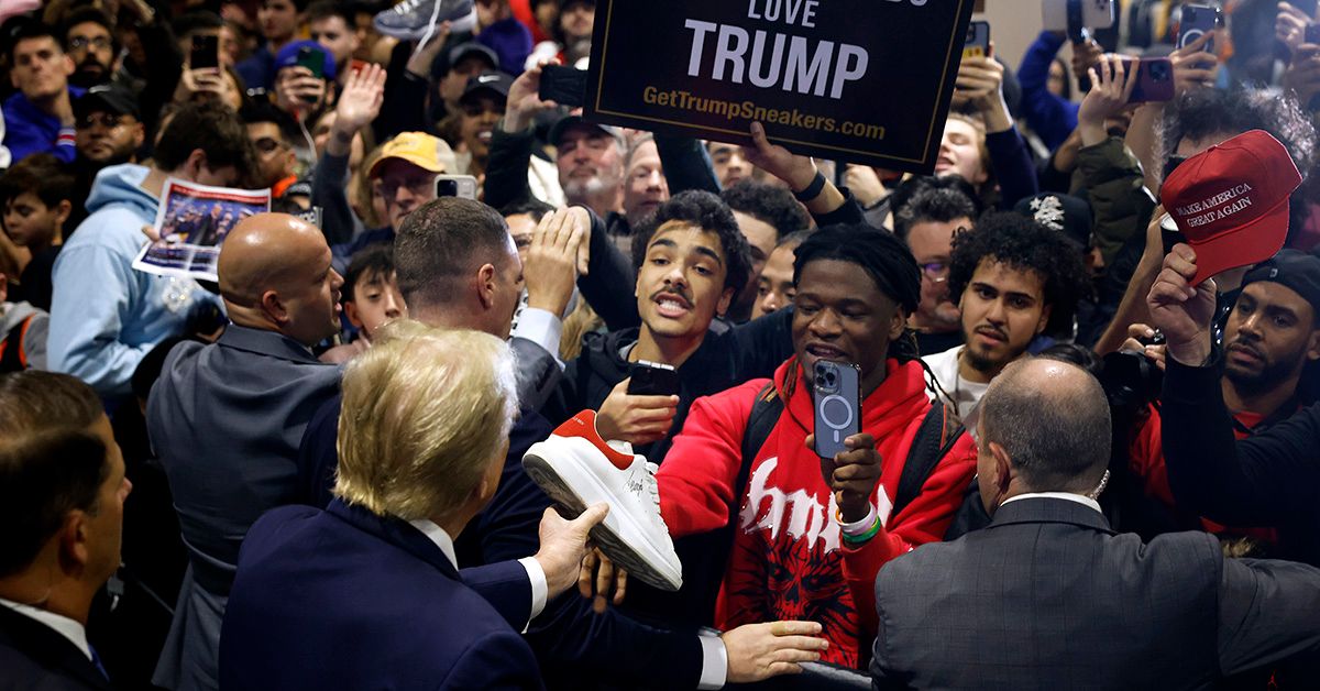 Former U.S. President Donald Trump autographs a shoe at a "Sneaker Con" event on Feb. 17, 2024, in Philadelphia, Pennsylvania. (Photo by Chip Somodevilla/Getty Images) (Chip Somodevilla/Getty Images)