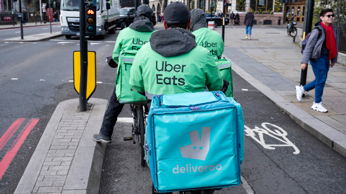 Uber Eats and Deliveroo takeout couriers in London on March 5, 2024. ( Getty Images)