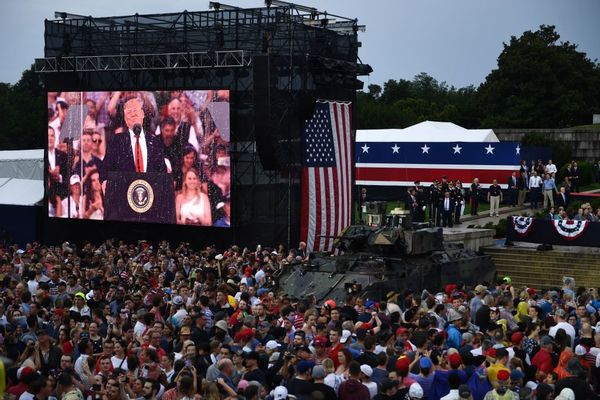 US President Donald Trump is shown on a screen next to a tank (R) during the "Salute to America" Fourth of July event at the Lincoln Memorial in Washington, DC, July 4, 2019. (Photo by Brendan Smialowski / AFP)        (Photo credit should read BRENDAN SMIALOWSKI/AFP/Getty Images) (Getty Images)
